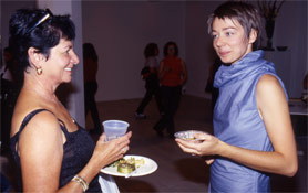 me talking to a guest at opening