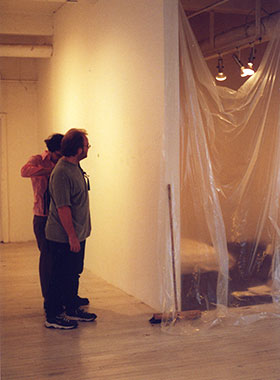 public walking through gallery space