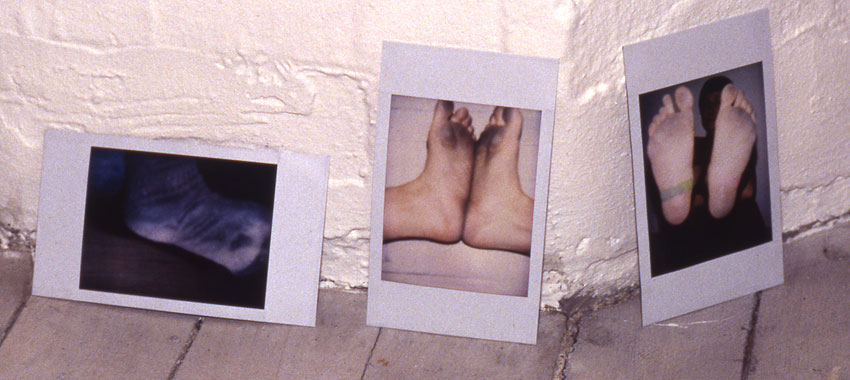 polaroids of soles of feet